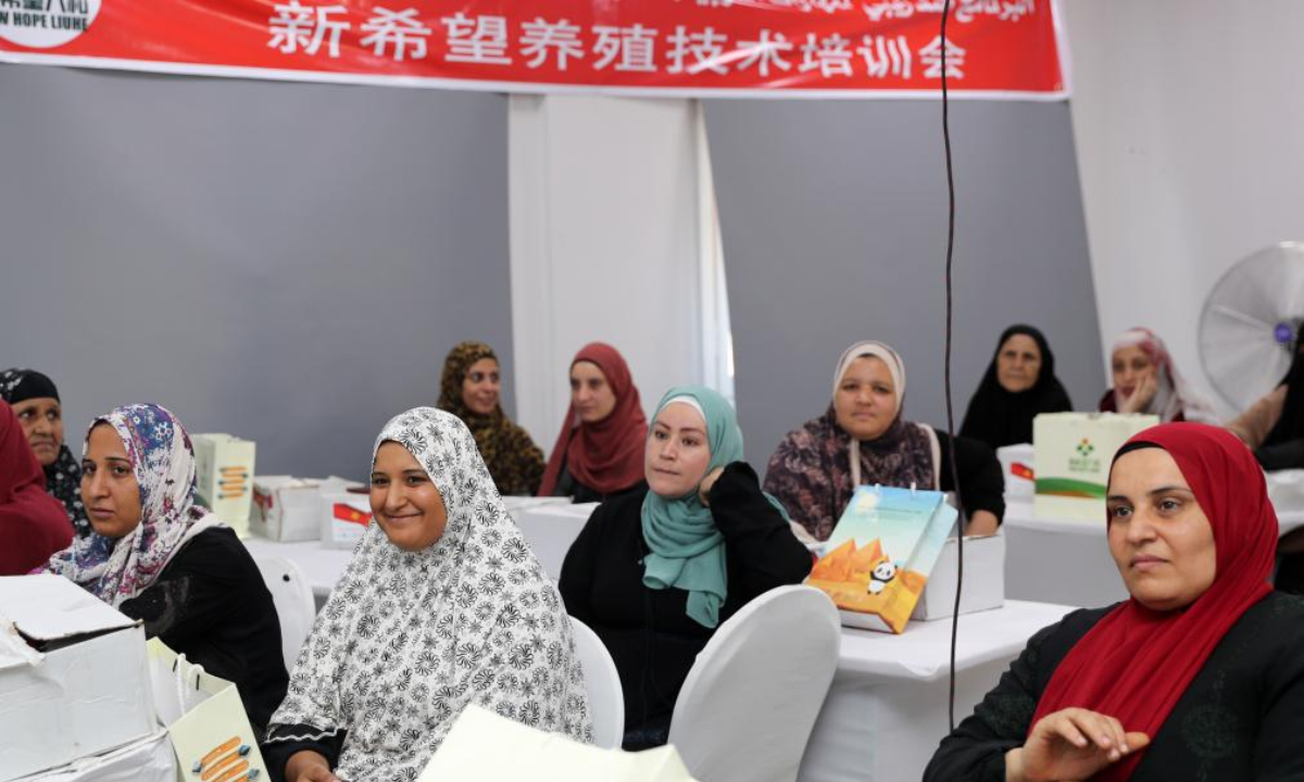 Women take a poultry farming training class after the launch ceremony of a poultry farming training program in Menoufia Governorate, Egypt, on Aug. 11, 2025. (Xinhua/Sui Xiankai)