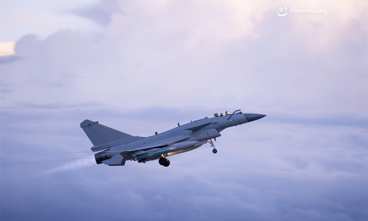 A J-10 fighter jet attached to an aviation unit with the air force under the Chinese PLA Southern Theater Command soars into the sky during a flight training exercise. (eng.chinamil.com.cn/Photo by Wang Guoyun)