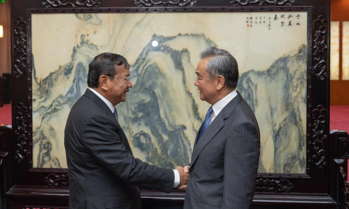 Chinese Foreign Minister Wang Yi, also a member of the Political Bureau of the Communist Party of China Central Committee, meets with Cambodian Deputy Prime Minister and Foreign Minister Prak Sokhonn, who is in China to attend the tenth Lancang-Mekong Cooperation (LMC) Foreign Ministers' Meeting, in Anning, southwest China's Yunnan Province, Aug. 14, 2025. (Xinhua/Gao Yongwei)
