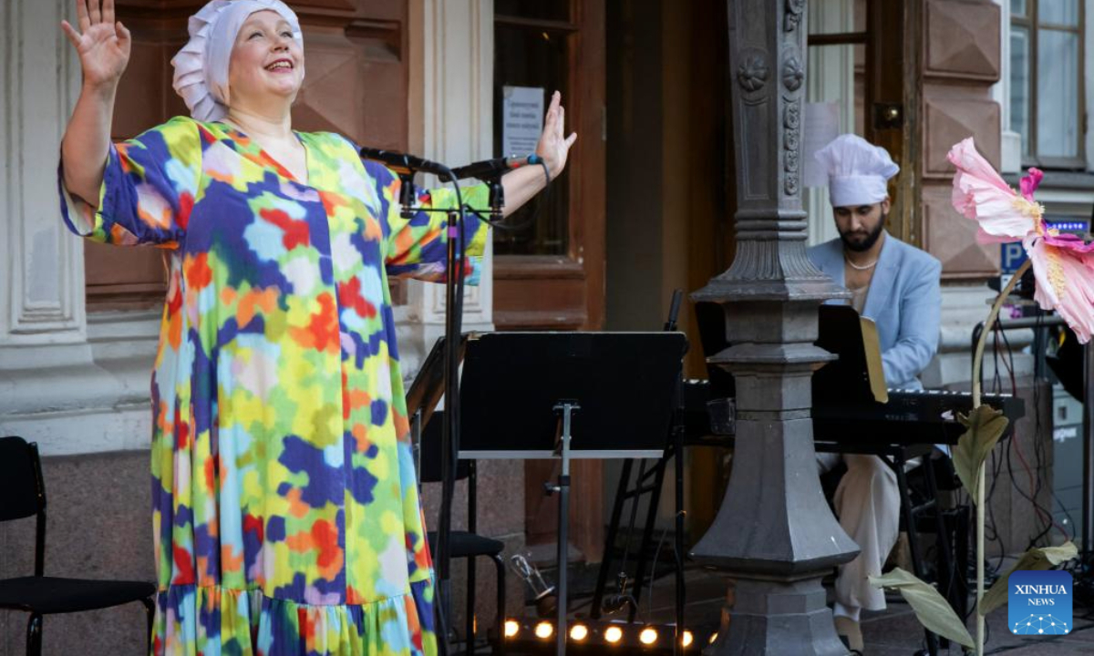 Artists perform during the Night of the Arts in Helsinki, Finland, Aug. 14, 2025. The event was held here on Thursday, featuring more than 370 free art and cultural activities, including music, dance, theater, painting, literature and other art forms. (Photo by Matti Matikainen/Xinhua)