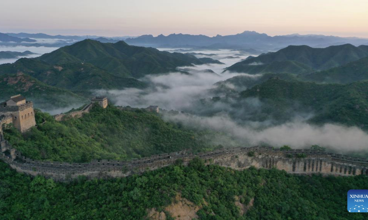 An aerial drone photo taken on Aug. 14, 2025 shows a view of the Jinshanling section of the Great Wall in Luanping County of Chengde, north China's Hebei Province. (Photo by Zhou Wanping/Xinhua)
