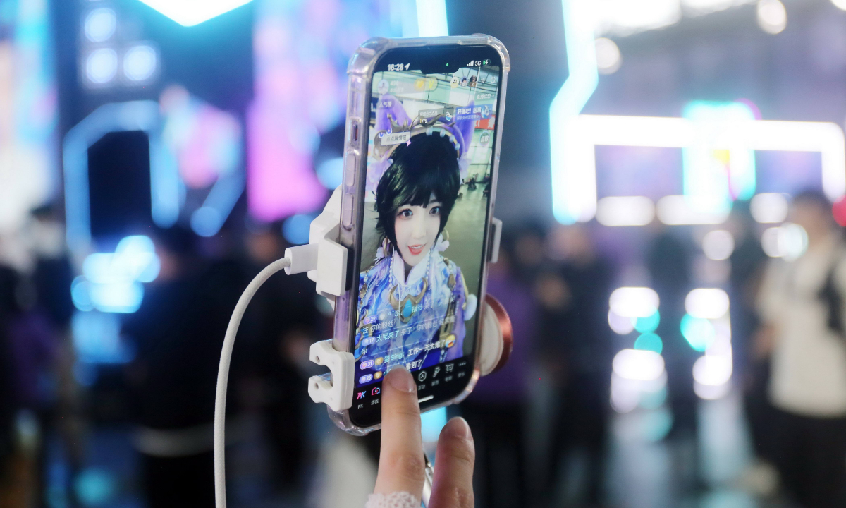 A livestreamer dressed in cosplay costumes broadcasts live from the China Digital Entertainment Expo and Conference (ChinaJoy) in Shanghai on August 4, 2025. Photo: IC
