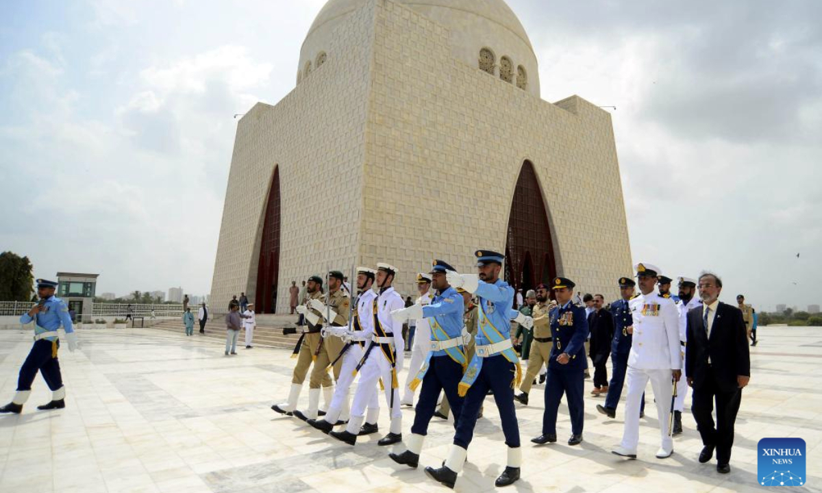 Pakistani soldiers attend a ceremony at the mausoleum of Pakistan's founder Muhammad Ali Jinnah to mark the country's Independence Day in southern Pakistani port city of Karachi on Aug. 14, 2025. (Str/Xinhua)