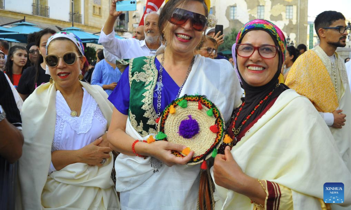 Tunisian women in traditional costumes are pictured during the celebration of the annual National Women's Day in Tunis, Tunisia, on Aug. 13, 2025. (Photo by Adel Ezzine/Xinhua)