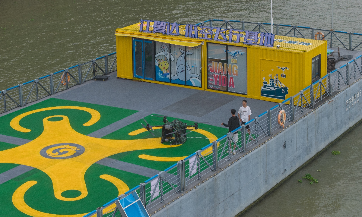 A drone smart logistics application platform is officially put into operation on August 13, 2025, in Nanjing, East China's Jiangsu Province. Crew members working on the water can now order delivery meals, with drones acting as 