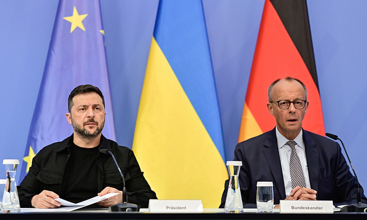 Ukrainian President Volodymyr Zelenskyy, left, and German Chancellor Friedrich Merz attend a video meeting of European leaders with US President Donald Trump on the Ukraine in Berlin, Germany, on August 13, 2025, ahead of the summit between the US and Russian leaders.