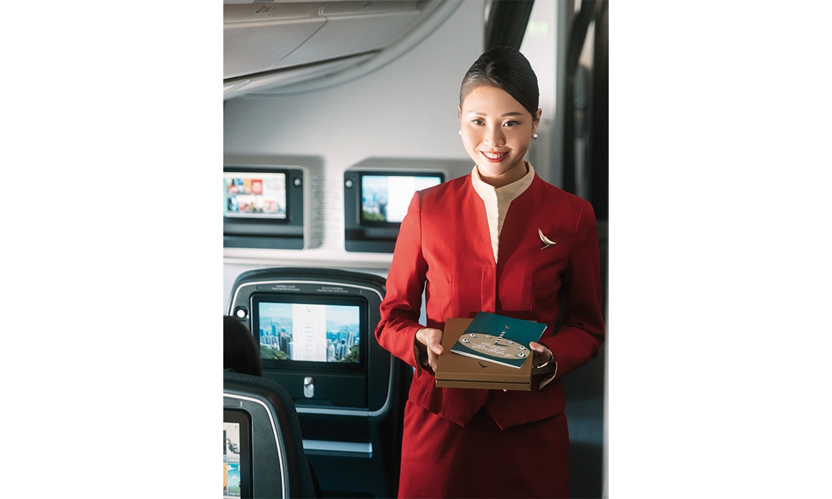 A Cathay Pacific flight attendant Photos: Courtesy of Milano Finanza
