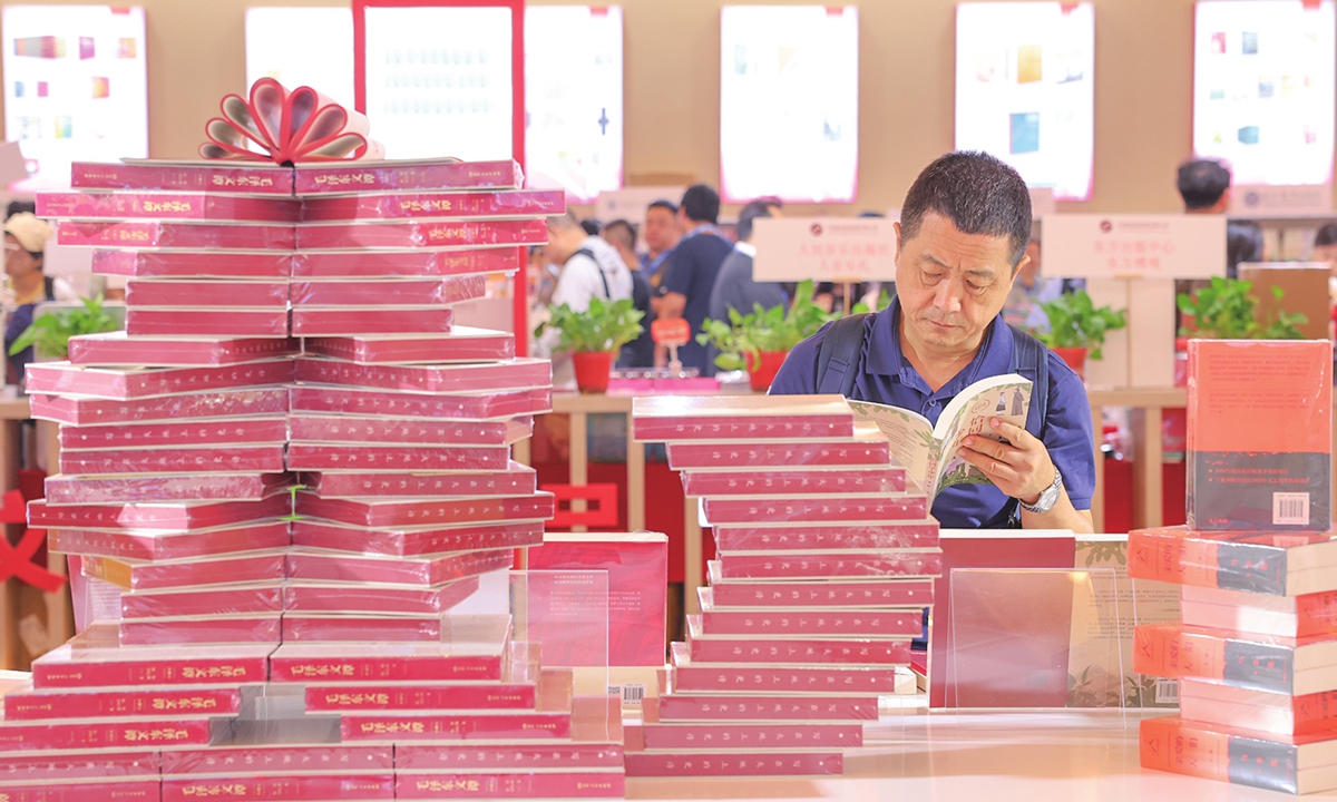 A man reads a book at the 2025 Shanghai Book Fair on August 13, 2025. Photo: Chen Xia/GT
