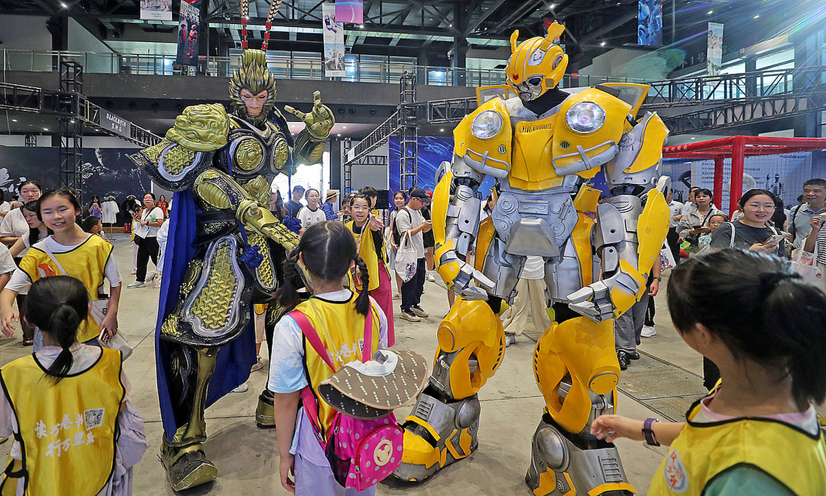 Young visitors explore the demonstration zone at the inaugural Wuzhen Youth Science and Technology Carnival, which opened in Tongxiang in Jiaxing, East China’s Zhejiang, on August 15, 2025. Held under the theme Technology Empowers Dreams, Creativity Connects the Future, the event aims to inspire the next generation of scientists and innovators by providing a platform where young minds can explore, experiment, and engage with cutting-edge technology. Photo: VCG