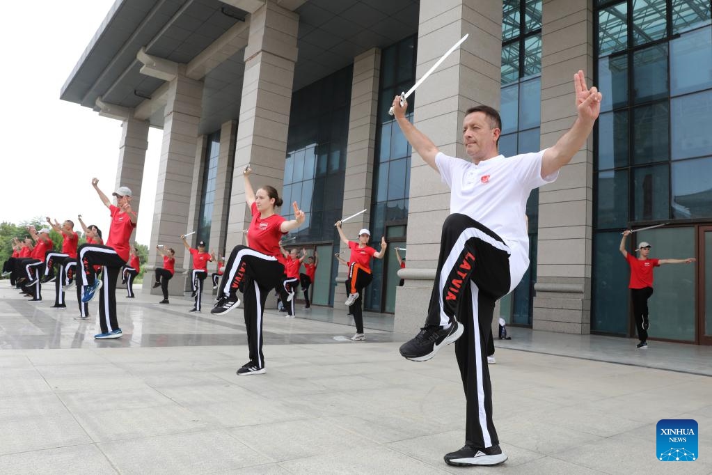 Latvian students practice Tai Chi at Chenjiagou Village of Wenxian County, Jiaozuo City, central China's Henan Province, Aug. 16, 2025. Twenty-nine students from Latvia are here on a 15-day program to study Tai Chi and experience the charm of Chinese martial arts.

Tai chi, a traditional martial art, began life in the mid-17th century at Chenjiagou before it spread to more than 150 countries and regions, attracting more than 100 million people to practise. (Photo by Xu Hongxing/Xinhua)

