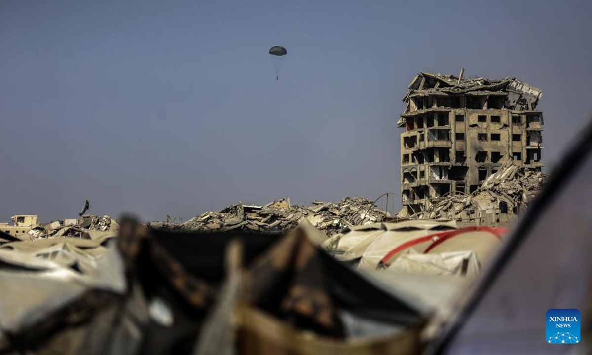 This photo shows an airdrop of food aid to the Sudanese area in northwest of Gaza City, on Aug. 15, 2025. (Photo by Rizek Abdeljawad/Xinhua)