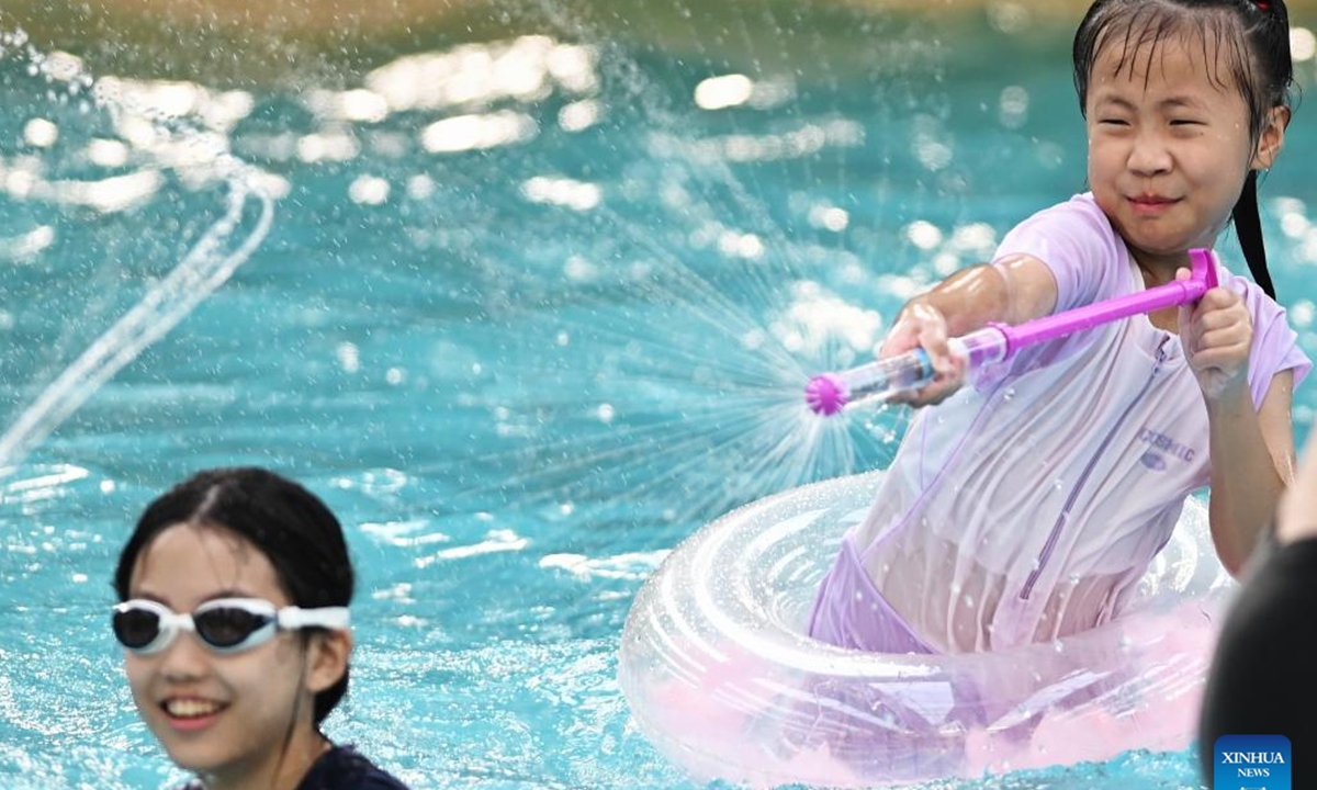 Children play at a water amusement park in Tengzhou City, east China's Shandong Province, Aug. 16, 2025. (Photo by Li Zhijun/Xinhua)