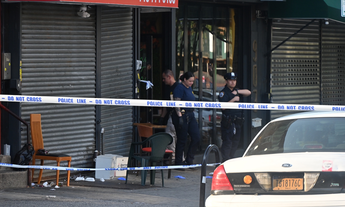A view of the crime scene where three people were killed and eight other people were injured in a mass shooting inside the Taste of the City Bar and Lounge in Crown Heights, Brooklyn, New York, US on August 17, 2025. The deceased are three men, who were 27, 35, and an unknown age. Eight others are at a local hospital, according to media reports.Photo: VCG