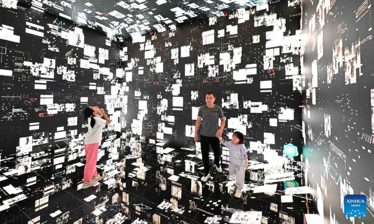 Children experience immersive reading at a library in Zhengding County of Shijiazhuang City, north China's Hebei Province, Aug. 16, 2025. (Photo by Chen Qibao/Xinhua)