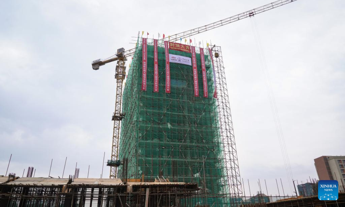Photo taken on Aug. 18, 2025 shows a view of the new Ethiopian Airlines Group headquarters building in Addis Ababa, Ethiopia. The new Ethiopian Airlines Group headquarters building, which is under construction in Addis Ababa, has topped out, marking completion of its main structural works. The topping-out ceremony of the 45-meter-high structure was held on Monday, attended by representatives from the Ethiopian Airlines Group and China Civil Engineering Construction Corporation (CCECC). (Xinhua/Han Xu)