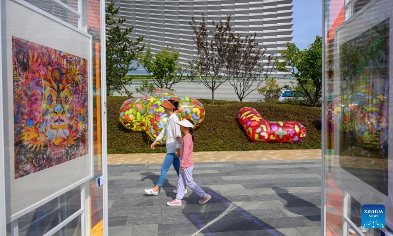 People visit an exhibition of the 2025 Grand Canal Public Art Season in Beijing, capital of China, Oct. 1, 2025. The 2025 Grand Canal Public Art Season kicked off here on Wednesday, enabling the public to experience the charm of art through interactive experiences. (Xinhua/Jin Liangkuai)