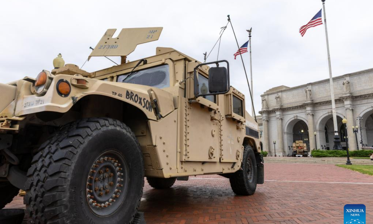 This photo taken on Aug. 19, 2025 shows a National Guard vehicle parked in front of Union Station in Washington, D.C., the United States. The U.S. state of Tennessee announced Tuesday that it is sending around 160 National Guard troops to Washington, D.C., after U.S. President Donald Trump asserted that crime and homelessness have been out of control in the nation's capital. (Xinhua/Hu Yousong)
