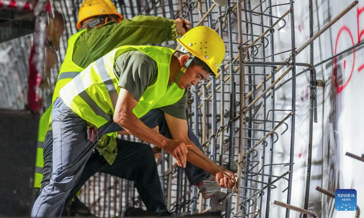 Workers work at the construction site of Binghui tunnel in Yiliang county of Zhaotong, southwest China's Yunnan Province, Aug. 19, 2025. As a key project of the Chongqing-Kunming high-speed railway, Binghui tunnel, with a total length of 21.17 kilometers, was successfully completed here on Tuesday.
Upon the full completion of the Chongqing-Kunming high-speed railway, travel time between Chongqing and Kunming will be significantly reduced, greatly enhancing transportation connectivity between the southwest region and the rest of the country, and promoting coordinated regional economic development. (Xinhua/Hu Chao)