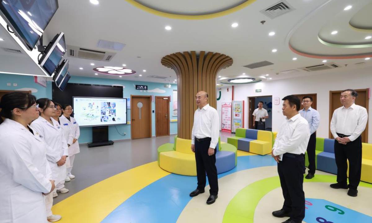 Chinese Vice Premier Liu Guozhong, also a member of the Political Bureau of the Communist Party of China Central Committee, visits medical workers at a community health services center in Beijing, capital of China, Aug. 19, 2025. Liu extended festival greetings on China's eighth Doctors' Day to all medical workers in China and credited them as vital contributors to the country's progress in public health. (Xinhua/Wang Ye)