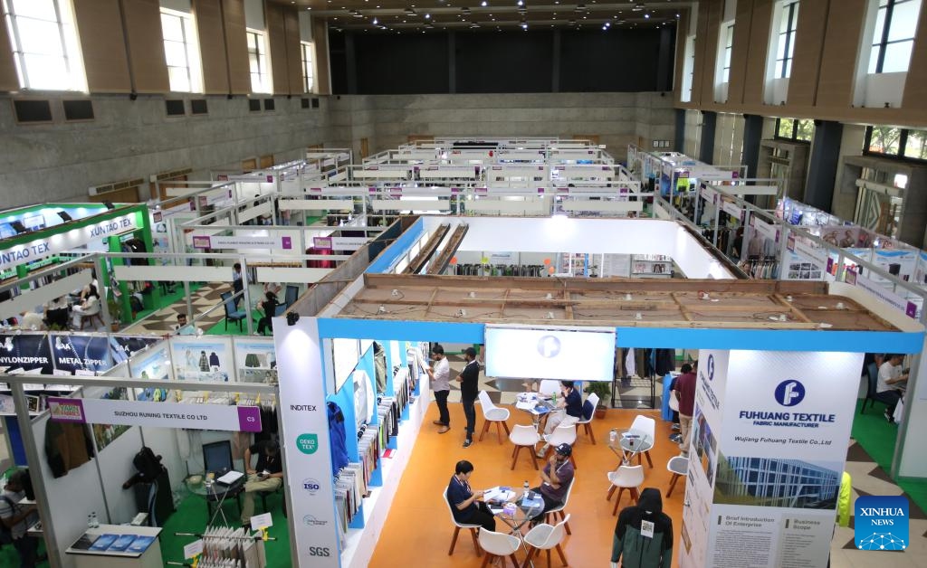 People visit the 11th Bangladesh Yarn, Fabrics and Accessories Show 2025 in Dhaka, Bangladesh, Aug. 15, 2025.

The event, with the participation of more than 100 overseas companies along with local exhibitors, is held in Dhaka from Aug. 14 to 18. It showcases the latest collections of yarn, fabrics, and garment accessories for the country's ready-made garment (RMG) sector. (Photo by Habibur Rahman/Xinhua)
