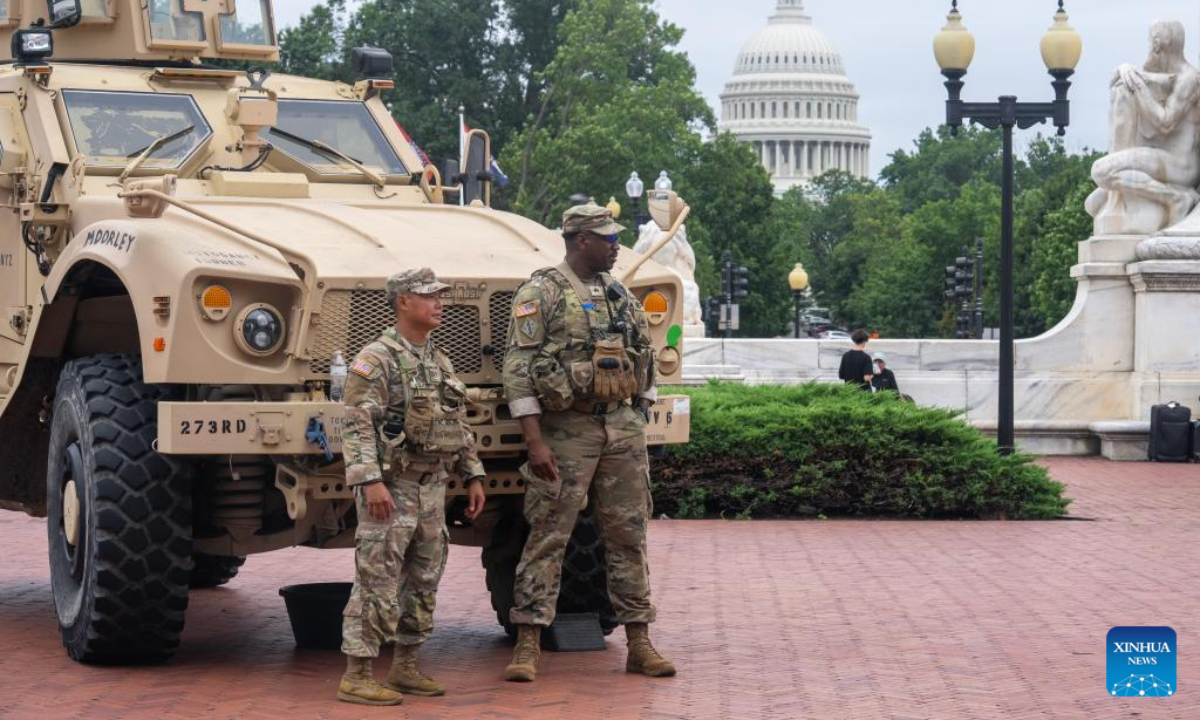 Members of the National Guard patrol outside Union Station in Washington, D.C., the United States, on Aug. 19, 2025. The U.S. state of Tennessee announced Tuesday that it is sending around 160 National Guard troops to Washington, D.C., after U.S. President Donald Trump asserted that crime and homelessness have been out of control in the nation's capital. (Xinhua/Hu Yousong)
