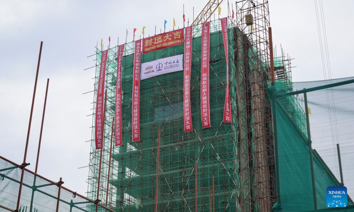 Photo taken on Aug. 18, 2025 shows a view of the new Ethiopian Airlines Group headquarters building in Addis Ababa, Ethiopia. The new Ethiopian Airlines Group headquarters building, which is under construction in Addis Ababa, has topped out, marking completion of its main structural works. The topping-out ceremony of the 45-meter-high structure was held on Monday, attended by representatives from the Ethiopian Airlines Group and China Civil Engineering Construction Corporation (CCECC). (Xinhua/Han Xu)
