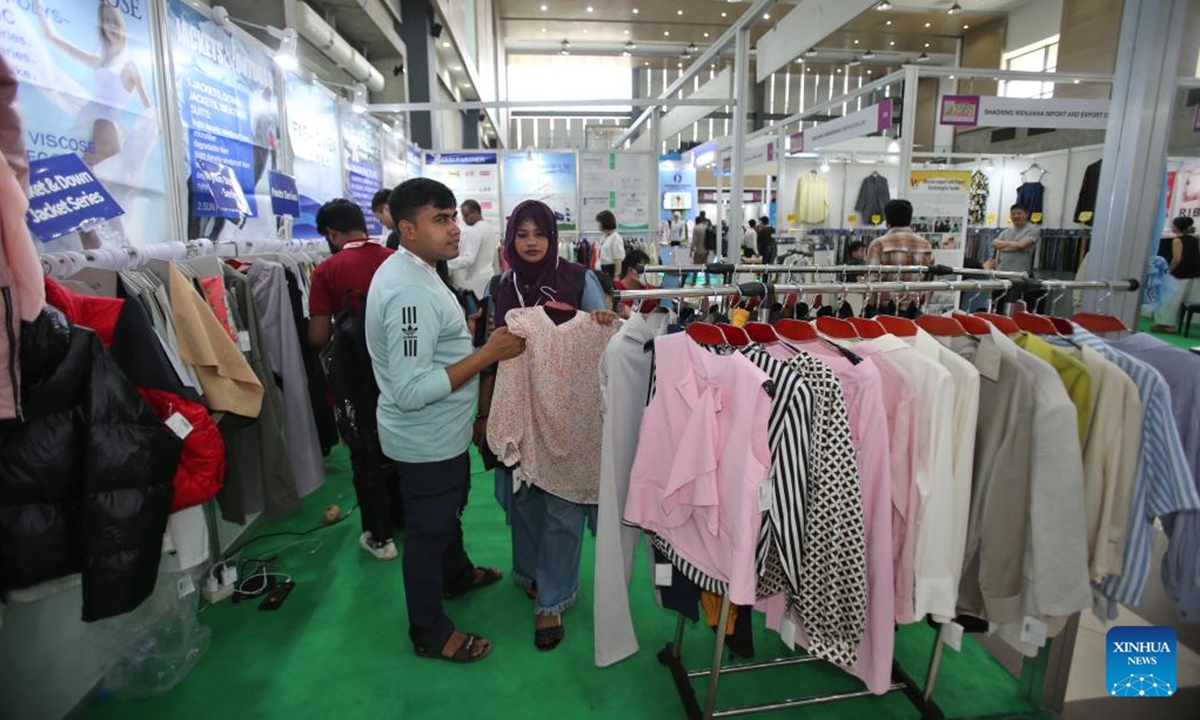 People visit the 11th Bangladesh Yarn, Fabrics and Accessories Show 2025 in Dhaka, Bangladesh, Aug. 15, 2025.

The event, with the participation of more than 100 overseas companies along with local exhibitors, is held in Dhaka from Aug. 14 to 18. It showcases the latest collections of yarn, fabrics, and garment accessories for the country's ready-made garment (RMG) sector. (Photo by Habibur Rahman/Xinhua)