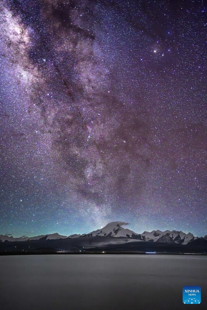 This photo taken on Aug. 14, 2025 shows the Milky Way above Baiku Co in Xigaze City, southwest China's Xizang Autonomous Region.

Baiku Co, with a water area of approximately 300 square kilometers, has its lake surface at an altitude of 4,590 meters. Thanks to the excellent air quality on the plateau, the Milky Way is clearly visible in the starry sky at the end of summer and the beginning of autumn, forming a magnificent scene together with the lake and snow-capped mountains. (Photo by Ma Lichao/Xinhua)