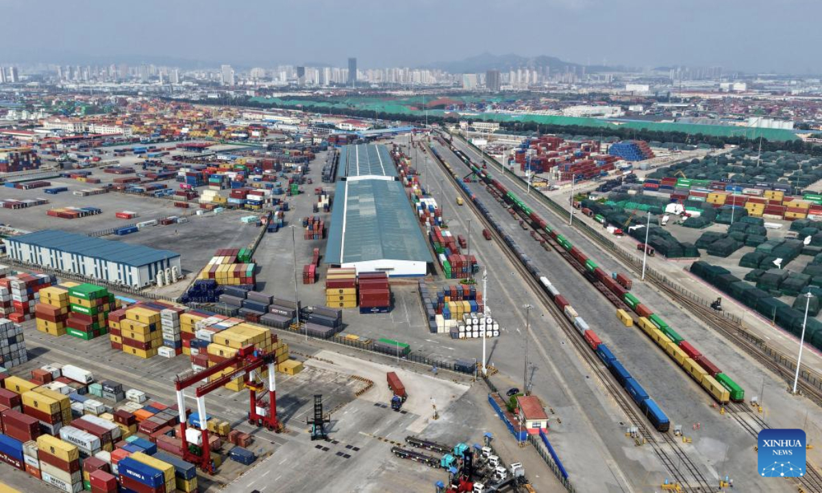 An aerial drone photo taken on Aug. 19, 2025 shows a view of Qingdao Port in Qingdao, east China's Shandong Province. As of the end of July, Qingdao Port has added 22 new outbound trade routes this year, bringing its total to 233 and connecting to over 700 ports in more than 180 countries and regions. (Xinhua/Li Ziheng)