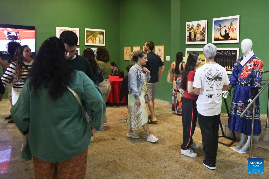 People visit a Chinese culture-themed exhibition during a celebration marking the 51st anniversary of China-Brazil diplomatic relations and the 80th anniversary of the victory in World War II, at Forte Copacabana in Rio de Janeiro, Brazil, Aug. 16, 2025. (Photo by Claudia Martini/Xinhua)