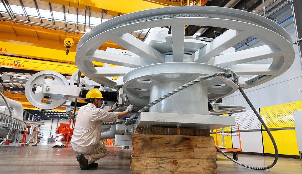 Workers rush to complete export orders for fluid loading and unloading arms at a little giant enterprise in Lianyungang, East China's Jiangsu Province, on August 18, 2025. China has cultivated 14,600 elite little giant firms - elite small and medium-sized enterprises that specialize in a niche market, boast cutting-edge technologies, and show great potential, official data showed. Photo: VCG