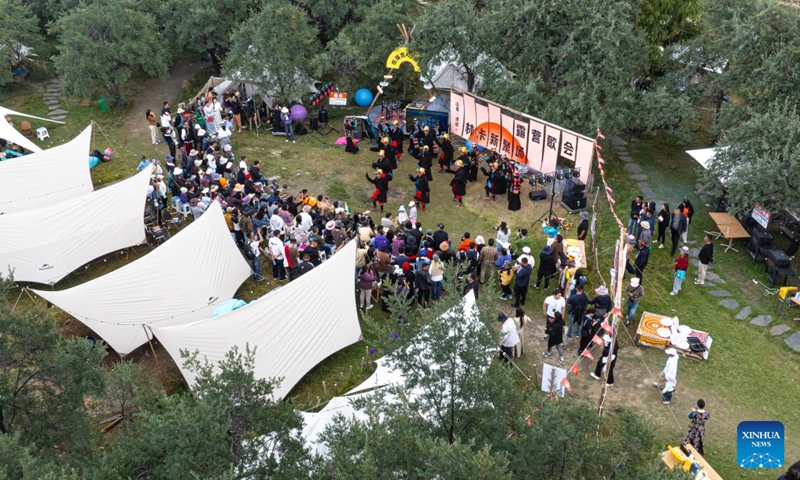An aerial drone photo taken on Sept. 13, 2025 shows people attending a Lingka festival in Qonggyai County of Shannan, southwest China's Xizang Autonomous Region.(Xinhua/Tenzin Nyida)
