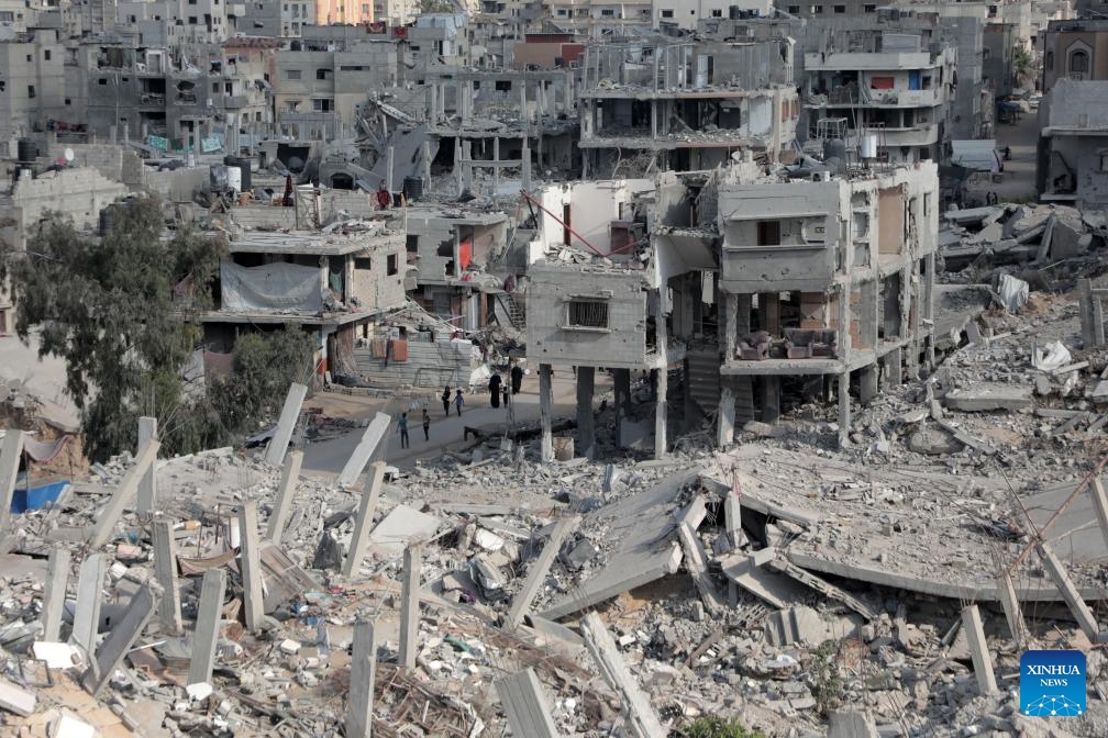 This photo taken on Oct. 6, 2024 shows destroyed buildings in the city of Khan Younis in the southern Gaza Strip. Israel launched a large-scale offensive against Hamas in the Gaza Strip to retaliate against an attack by the former on the southern Israeli border on Oct. 7, 2023, during which about 1,200 people were killed and about 250 taken hostage. Over the year, Israeli attacks on Gaza have killed 41,825 Palestinians and injured 96,910, according to the latest figures from Gaza health authorities. (Photo: Xinhua)