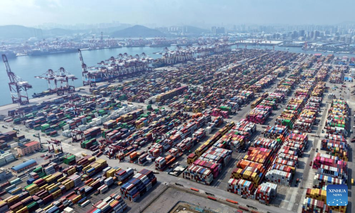 An aerial drone photo taken on Aug. 19, 2025 shows a view of Qingdao Port in Qingdao, east China's Shandong Province. As of the end of July, Qingdao Port has added 22 new outbound trade routes this year, bringing its total to 233 and connecting to over 700 ports in more than 180 countries and regions. (Xinhua/Li Ziheng)