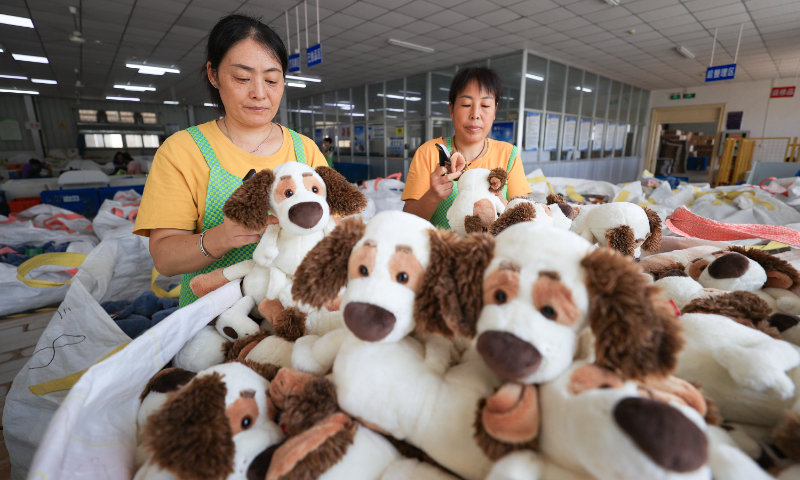 Workers rush to produce plush toys for export in a factory in Ganyu District, Lianyungang, East China's Jiangsu Province, on August 19, 2025. Ganyu's toy industry, a local specialty, exports to more than 60 countries and regions. China is the world's largest toy producer and exporter, with toy exports reaching $39.87 billion in 2024, official data showed. Photo: VCG