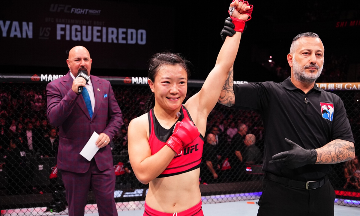 Shi Ming of China reacts after her victory over Feng Xiaocan of China in their Women's Strawweight RTU Tournament Final fight during the UFC Fight Night event at Galaxy Arena on November 23, 2024 in Macao, China. Photo: VCG