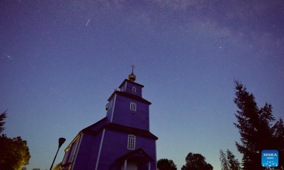 This long-exposure photo taken on Aug. 22, 2025 shows Perseid meteor shower over Rogacze, Poland. The Perseid meteor shower can be seen until Aug. 24 this year. (Photo by Jaap Arriens/Xinhua)