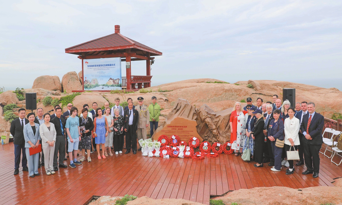The unveiling ceremony of the Memorial for Dongji Fishermen's Rescue of British Prisoners of War is held in the Dongji Islands archipelago on May 20, 2025. Photo: VCG