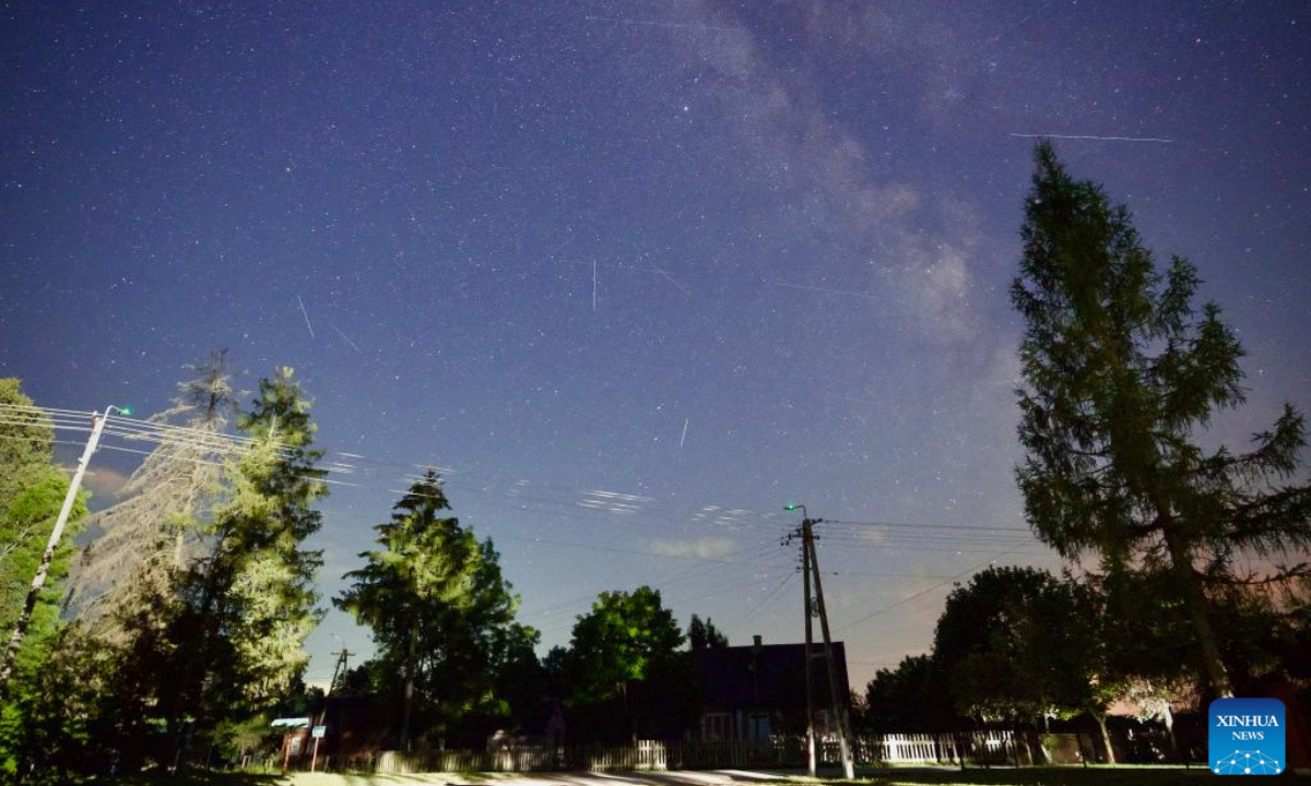 This long-exposure photo taken on Aug. 22, 2025 shows Perseid meteor shower over Rogacze, Poland. The Perseid meteor shower can be seen until Aug. 24 this year. (Photo by Jaap Arriens/Xinhua)