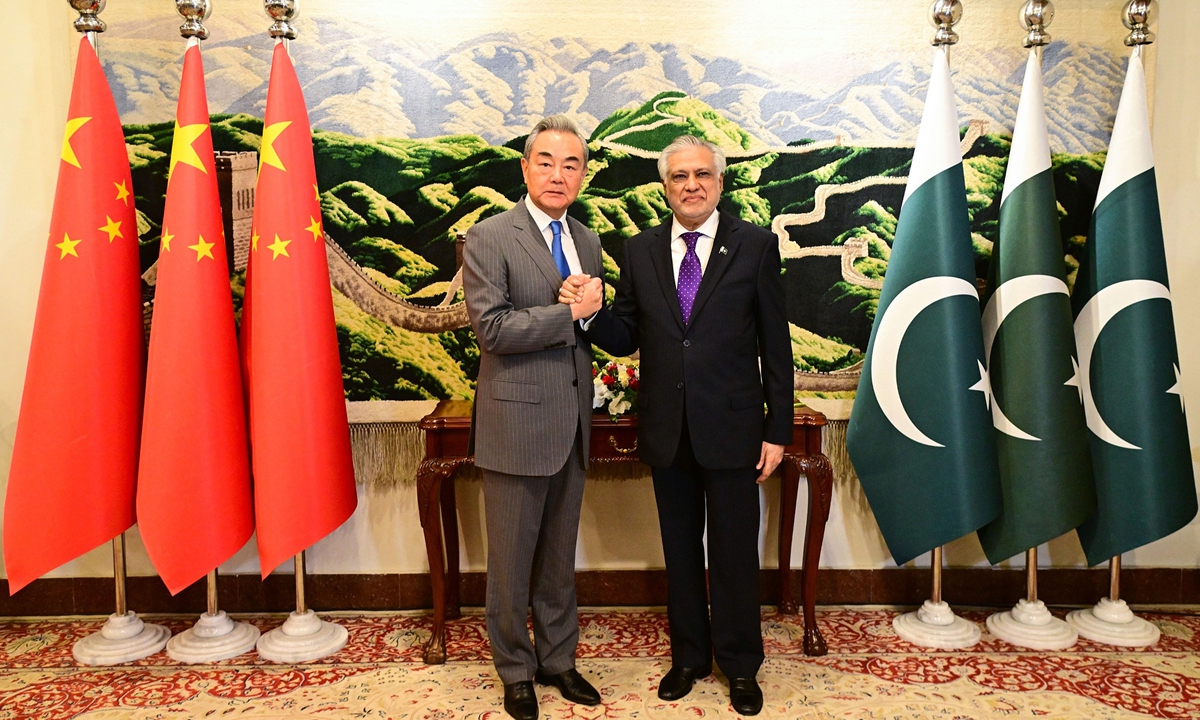 Wang Yi, a member of the Political Bureau of the Communist Party of China Central Committee and Chinese Foreign Minister, meets with Mohammad Ishaq Dar, Pakistani Deputy Prime Minister and Foreign Minister in Islamabad, Pakistan, 21 August 2025. Photo: VCG