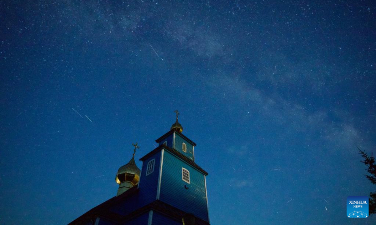 This long-exposure photo taken on Aug. 22, 2025 shows Perseid meteor shower over Rogacze, Poland. The Perseid meteor shower can be seen until Aug. 24 this year. (Photo by Jaap Arriens/Xinhua)