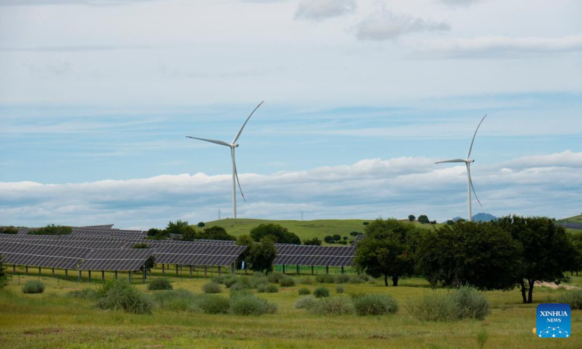 This photo taken on July 29, 2025 shows wind turbines and photovoltaic panels at the site of a desertification control project integrated with wind and solar power facilities in Horqin Right Wing Middle Banner of Hinggan League, north China's Inner Mongolia Autonomous Region. In recent years, Inner Mongolia has focused on the desertification control of the Horqin sandy land. The local authorities implemented projects integrating sand control and wind and solar power industries, establishing renewable energy facilities alongside afforestation and soil improvement efforts. (Xinhua/Ding He)