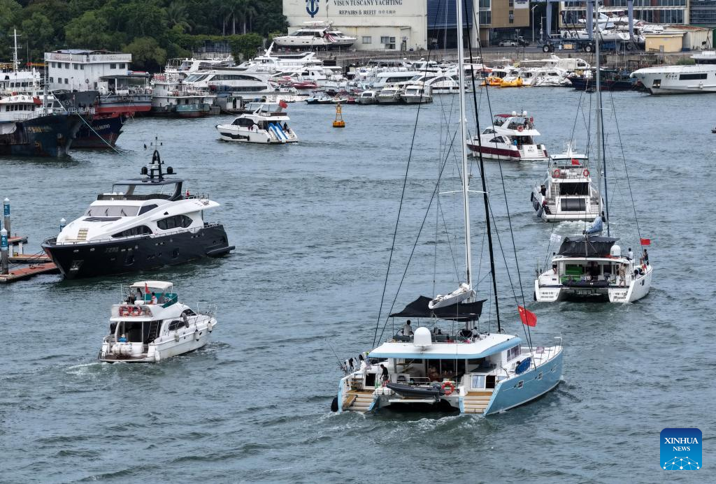 An aerial photo taken on Aug 23, 2025 shows yachts at a dock in Sanya, south China's Hainan Province. China on Saturday activated a Level-IV emergency response to flooding and typhoon in Hainan Province as Typhoon Kajiki, the 13th typhoon of this year, is approaching, according to the Ministry of Emergency Management. (Xinhua/Zhao Yingquan)