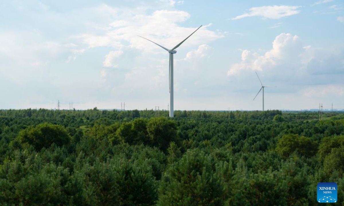 This photo taken on July 28, 2025 shows forests of a desertification control project in Horqin Left Wing Rear Banner of Tongliao City, north China's Inner Mongolia Autonomous Region. In recent years, Inner Mongolia has focused on the desertification control of the Horqin sandy land. The local authorities implemented projects integrating sand control and wind and solar power industries, establishing renewable energy facilities alongside afforestation and soil improvement efforts. (Xinhua/Ding He)