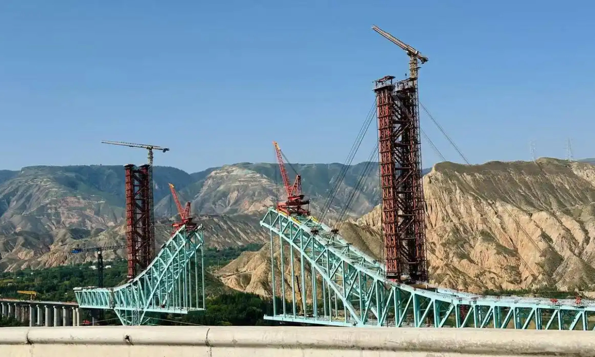 File Photo: Jianzha Yellow River Bridge in Qinghai in construction 