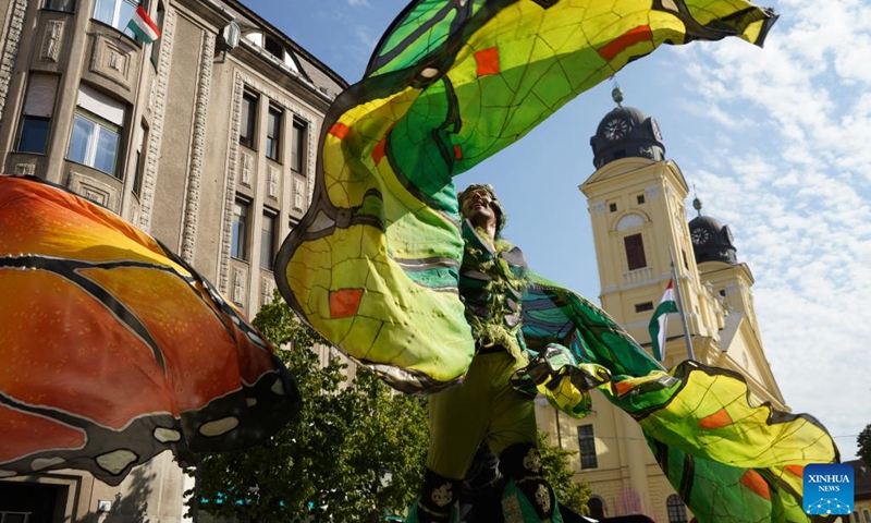 A reveller attends a parade during the Debrecen Flower Carnival to celebrate the National Day in Debrecen, Hungary, Aug. 20, 2025. Photo: Xinhua