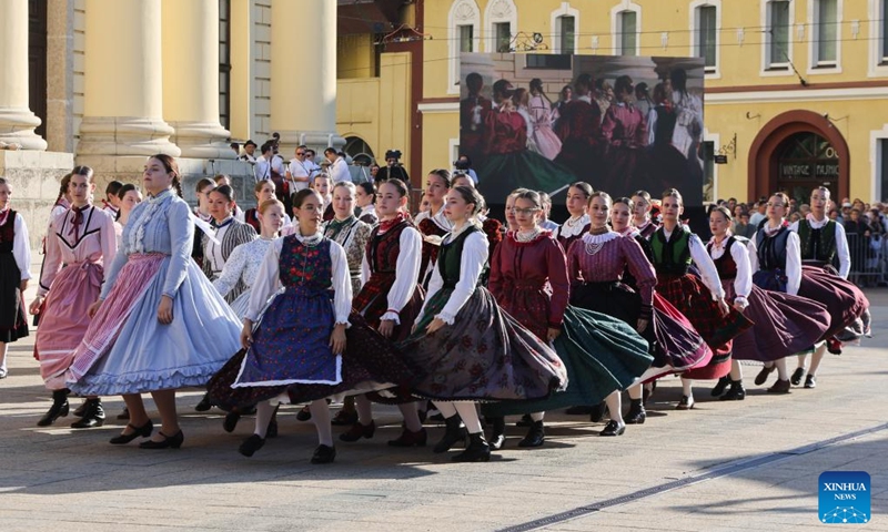 Revellers attend a parade during the Debrecen Flower Carnival to celebrate the National Day in Debrecen, Hungary, Aug. 20, 2025. Photo: Xinhua