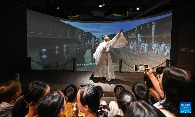 This photo taken on Aug. 20, 2025 shows a scene during a live performance at Hairui cultural park in Haikou, south China's Hainan Province. The park has launched a regular night theater, staging free live performances for visitors. Photo: Xinhua