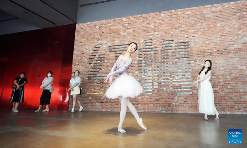 Sun Yujia (2nd R), a dancer from the Liaoning Ballet Troupe, lead citizens to experience ballet at a cultural and creative park in Shenyang, northeast China's Liaoning Province, July 30, 2025.

The Liaoning (Shenyang) Ballet Competition was held in Shenyang from Aug. 8 to 14, attracting more than 400 contestants from over 10 countries and regions.

Established in Shenyang in 1980, the Liaoning Ballet Troupe has been thriving along with this industrial hub for more than four decades. A school affiliated to the Troupe was launched in 1994, which has been training dancers from all over the world since then. Photo: Xinhua