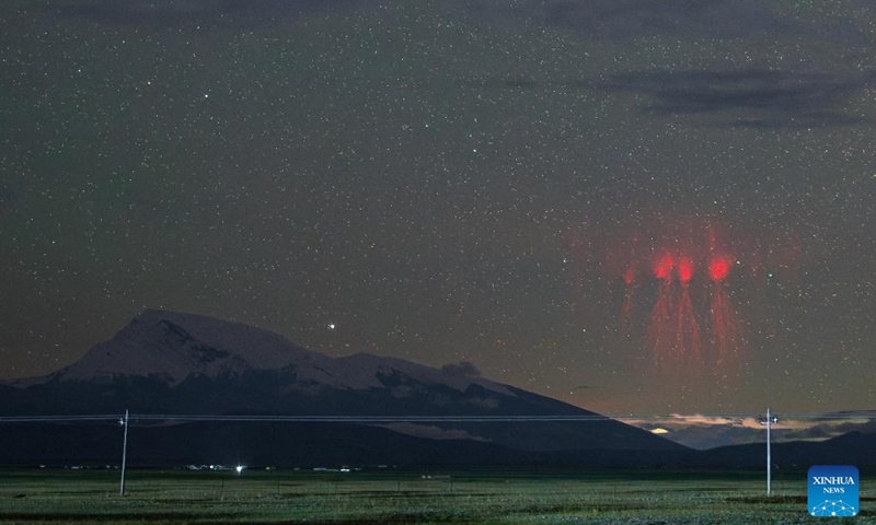 This photo taken on Aug. 21, 2025 shows a rare red lightning phenomenon known as red sprites captured near Mount Kangrinboqe, a sacred site for followers of Hinduism and Buddhism located at an elevation of 6,656 meters in southwest China's Xizang Autonomous Region. Photo: Xinhua